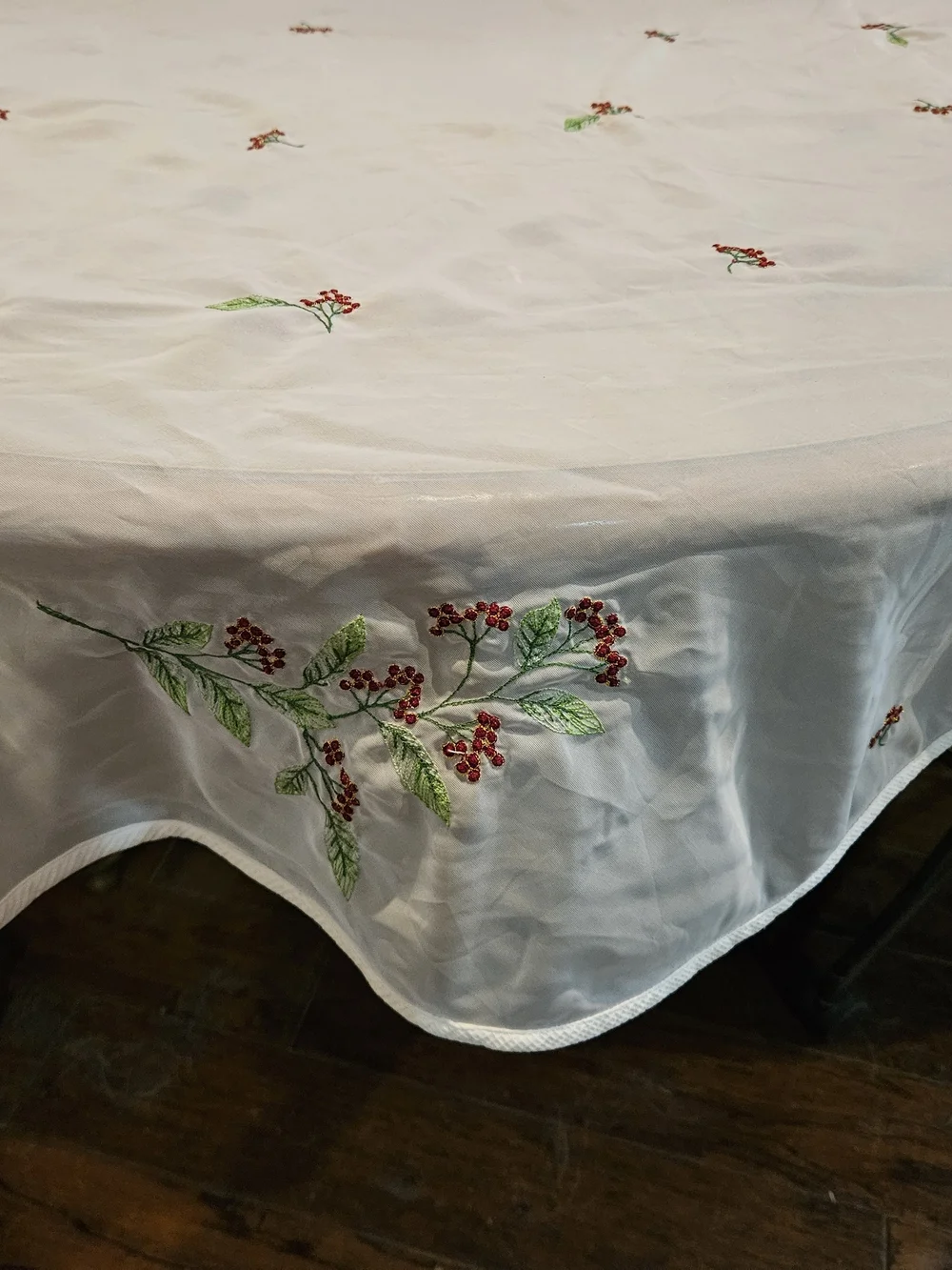 Embroidered White Round Tablecloth with Red Floral Accents
